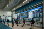 Exploring how Georgia Tech and Duke use technology to enhance their college sports programs.